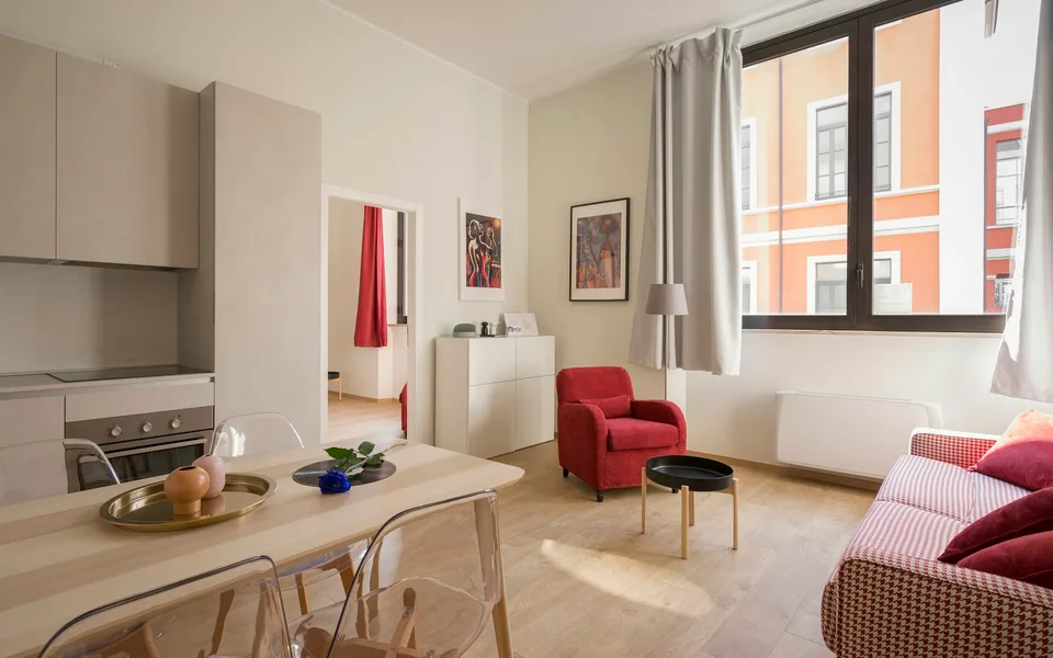 A warm living room styled with handmade ceramics and textiles