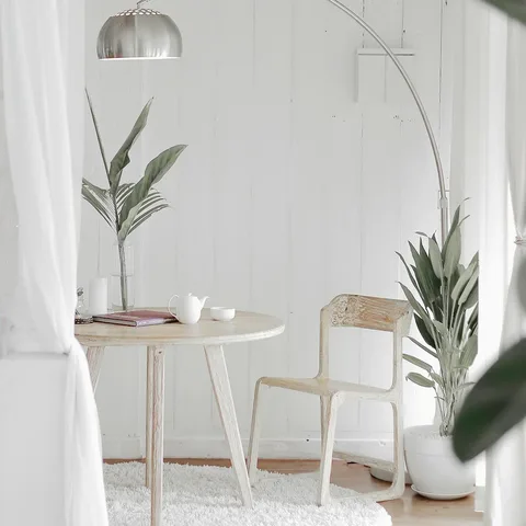 Cane breakfast nook with table and chair