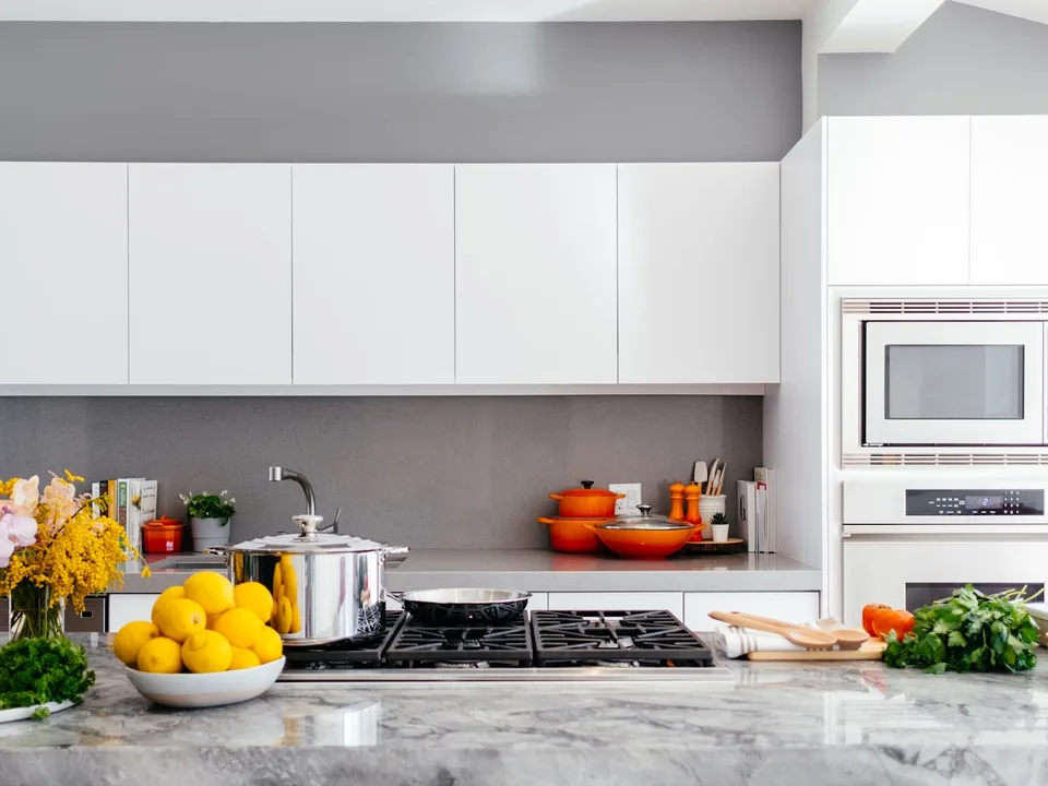 Modern kitchen with newly fitted mixer tap