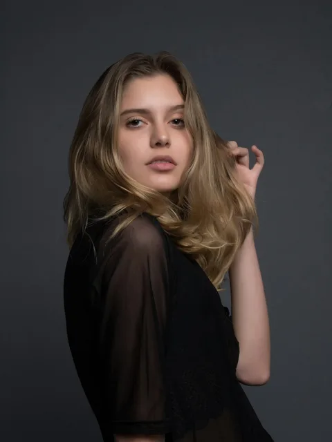 Editorial beauty portrait in low studio light